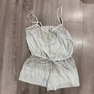 Gorgeous In Bloom Romper With a Floral Print. Size Small Excellent Condition!